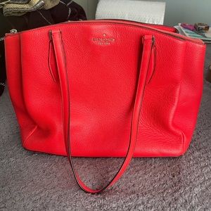 Poppy Red Kate Spade bag with Black piping and tan interior